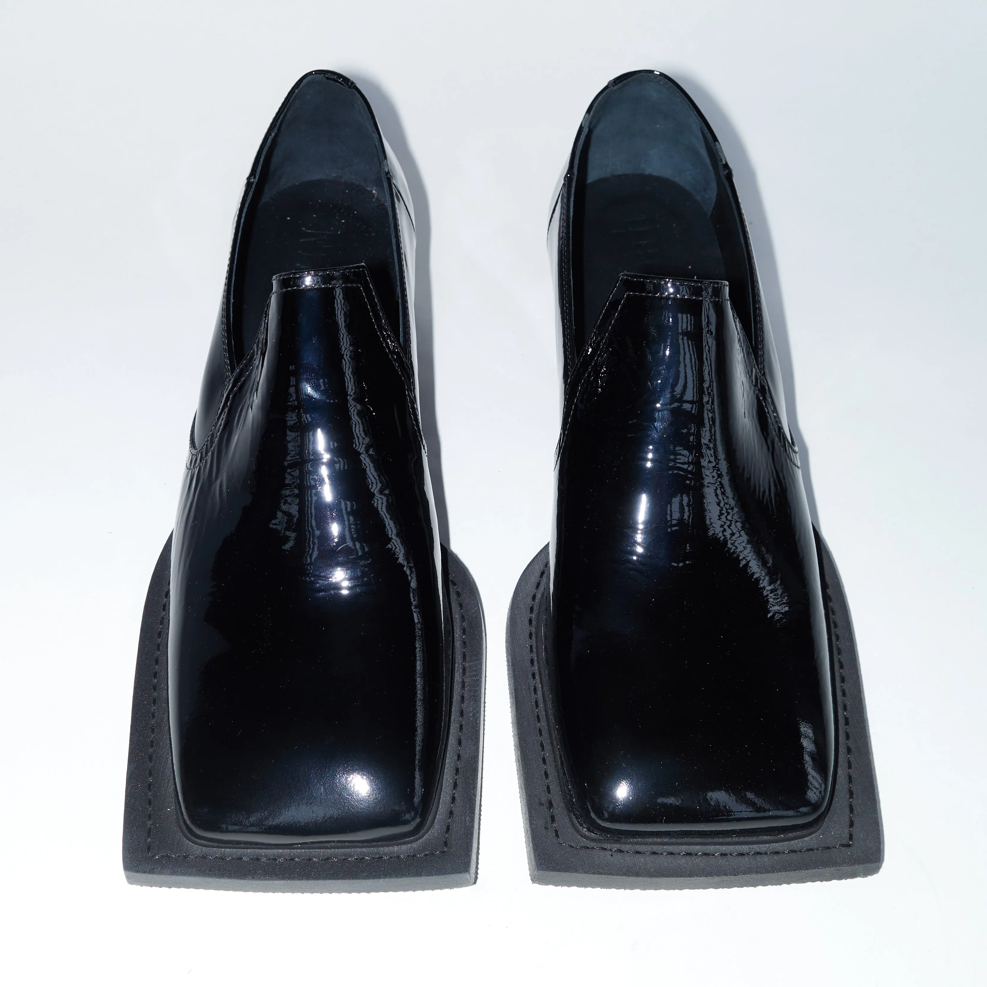 Howled in Patent Black Leather