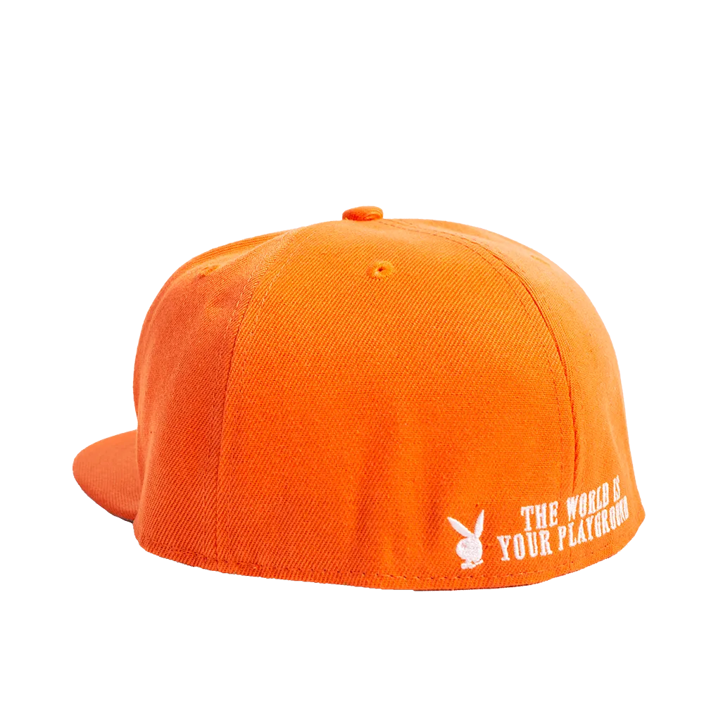 PLAYBOY THE WORLD IS YOUR PLAYGROUND PEACH FITTED HAT